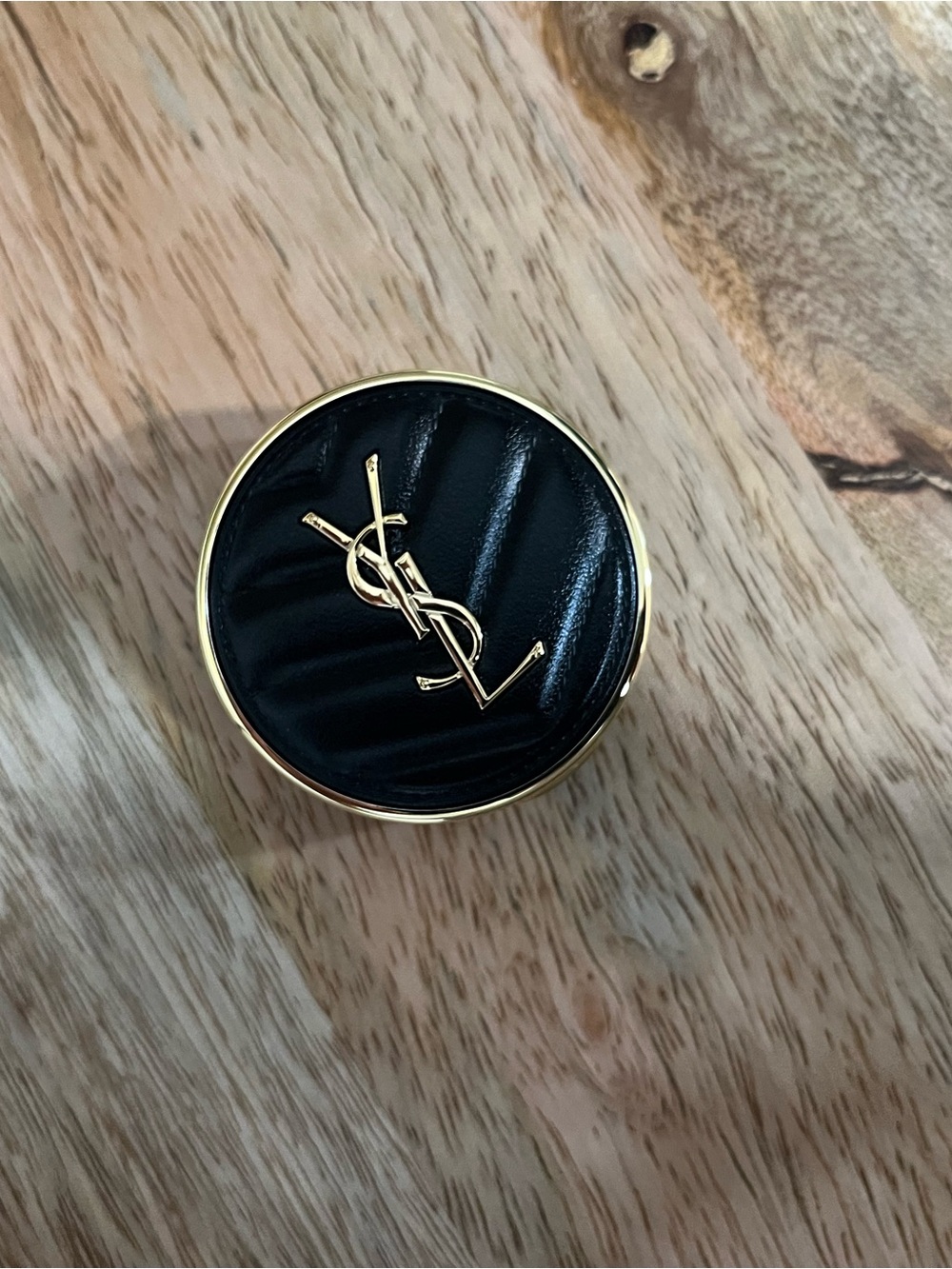 Yves Saint Laurent Black and Gold cushion foundation with YSL Monogram